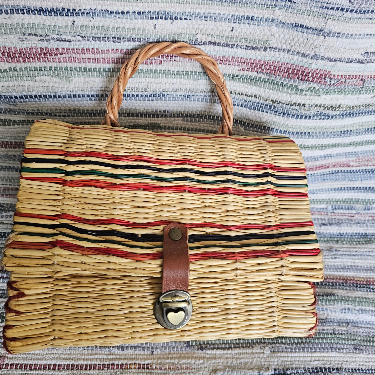 Handwoven Striped Straw Handbag with Heart Clasp